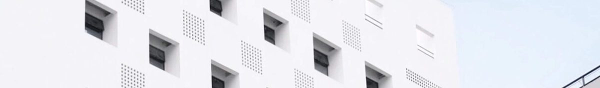 facade-of-a-white-building-2023-11-27-04-53-04-utc.jpg